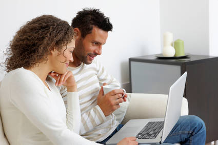 Couple comparing mortgages