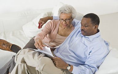 Senior couple reading documents